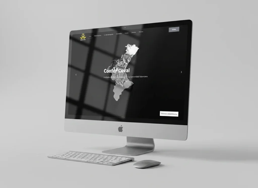 Mockup en escritorio de la portada de la web de Confer Coval, diseñada por Creatias Estudio
