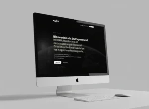 Mockup en escritorio de la portada de la web de Nexha Hairtech, diseñada por Creatias Estudio